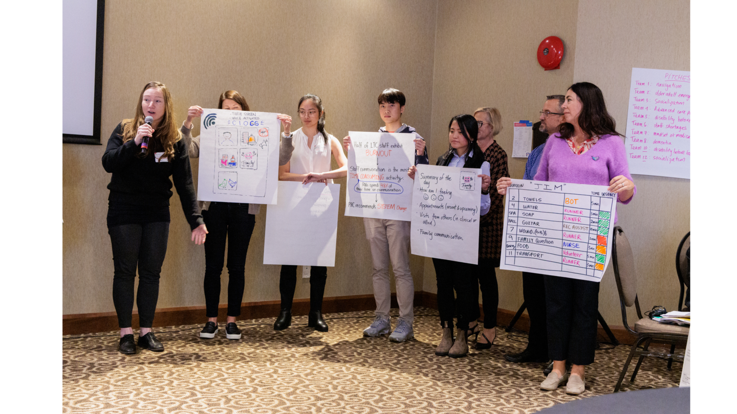 The team presents their pitch at Skunkworks: Hacking Aging. From left to right: Jennifer Gibson, Azra Sharma, Sara Suntano, Ryan Yeung, Maria Boteros, Tulia Ferreira, Jeff Lorz, Danielle Richards